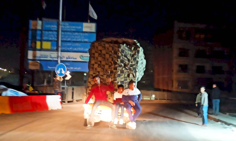 Cairo people in a truck
